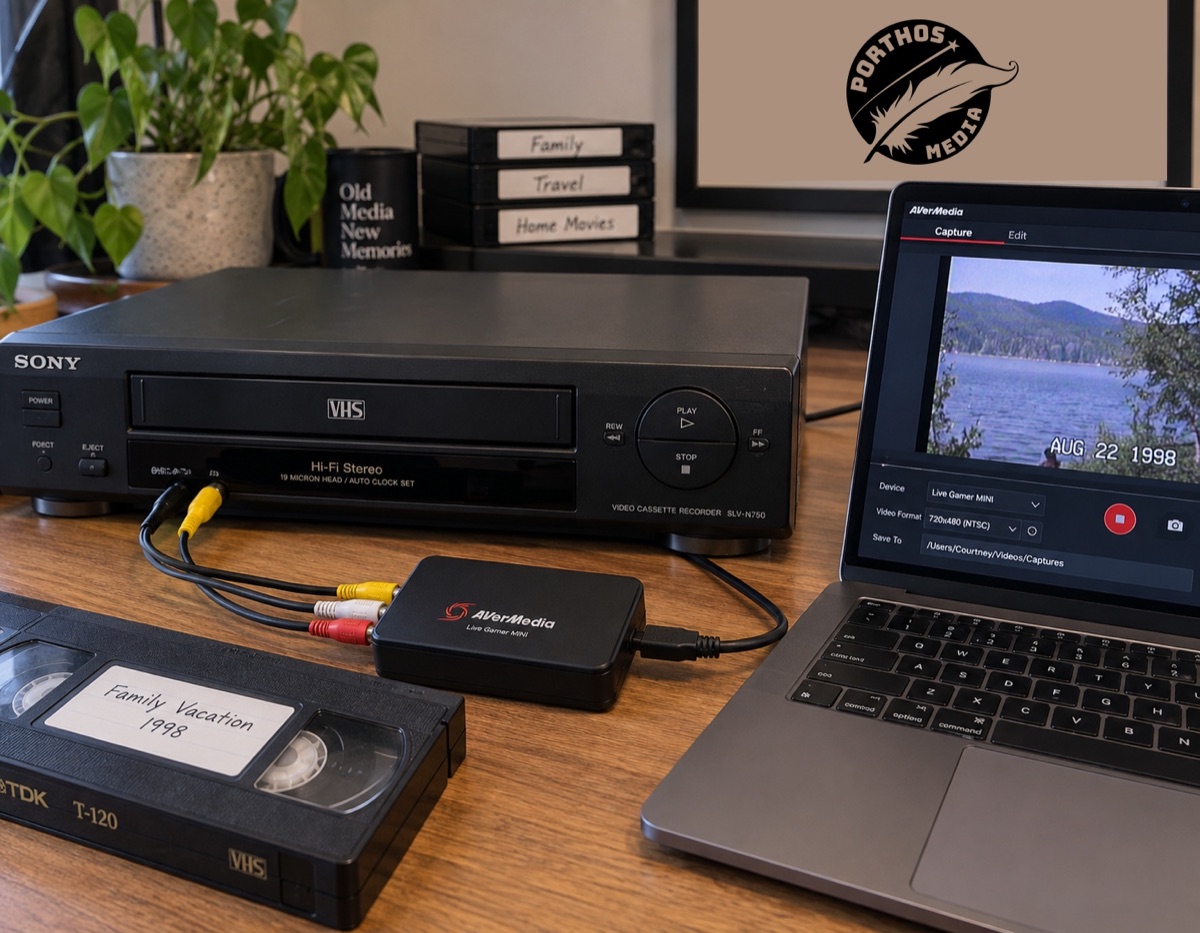 VHS player, capture equipment and laptop displaying a home movie, with Porthos Media branding.